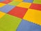 Background of Colorful Tiled Jigsaw Mats for Yoga or Playground