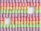 Background from colorful zephyr. Rows of marshmallows. Geometric pattern