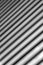 Background consisting of light and dark stripes of diagonally with a gradual blurring