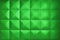 Background consists of large light green squares. Unusual, beautiful and modern background. Rhombic light green color wall of big