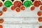 Background copy space banner of iced buttercream Christmas holiday sugar cookies and sprinkles