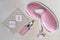 background for cosmetics product presentation with Microneedle eye Patches, rose quartz massage roller, sleeping mask