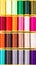 Background for crafts and DIY concept multicolor roll of Sewing