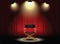 Background curtain and director\'s chair with spotlight