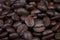 Background of dark full roasted coffee beans