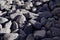 Background of dark grey stones.