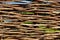 Background of decorative rustic village wicker fence