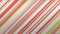 Background with diagonal multicolored stripes in red, green and white colors