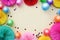 Background with different circle paper and baloons of origami. Birthday, holiday or party background. Flat lay style.