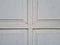 The background of the door of the house with white paint combined with black shadowed lines