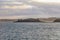 Background of dramatic sunrise on the sailing boat with tranquil sea water and epic morning sky, romantic Britanny coastline,