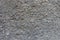 Background - dusty wall with coarse gray roughcast finish