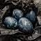 Background with easter eggs. Naturally dyed eggs prepared for Easter on on black crumpled paper. Happy Easter