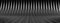 A background of an Elegant and Modern 3D Rendering image of a dark grey carbon fiber cable rising like a wall