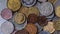 Background of Euro coins money.Numismatics.United kingdom Pound coin.US coins.Coins of different countries of the world. Iron