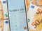 Background of the fifty euros banknotes with calculator on phone screen