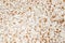 Background of Finely crushed eggshells of different colors close-up