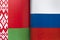 Background of the flags of belarus and russia. The concept of interaction or counteraction between the two countries