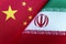 Background of the flags of iran and China. The concept of interaction or counteraction between the two countries