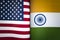 Background of the flags of north india and USA. The concept of interaction or counteraction between the two countries