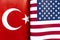 Background of the flags of Turkey and USA. The concept of interaction or counteraction between the two countries