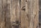 Background in the form of a wooden surface of gray color with vertical textural stripes on wood