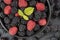 Background from fresh organic blackberries and raspberries, close up. Top view blackberry and raspberry