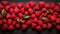 Background of fresh sweet red raspberries arranged together representing concept of healthy diet