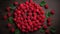 Background of fresh sweet red raspberries arranged together representing concept of healthy diet