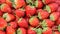 Background from freshly organic red strawberries
