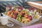 Background Fruit Platter of Strawberries Grapes Blueberries Peaches Apricot Banana Sweet Cherries Pears on Ice