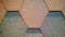 Background of geometric shapes. Gray, brown, rusty rhombuses. The beauty of symmetry, straight lines and geometry. Bituminous tile