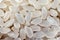 Background of grains of cereals of white raw rice