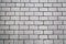 Background of gray artificial pavers rectangular shape with a crack