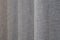 Background gray beige linen curtain close up