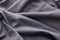 Background of grey crumpled textured cloth