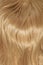 Background  hair close-up golden blond. Vertical photo