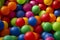 background of a heap of colored plastic balls in the playground