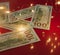 Background for holiday card with money US dollars. Background of one hundred dollar bills. Banknotes, paper currency on red