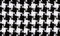 Background with houndstooth fabric pattern