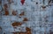 Background image of an abandoned brick wall with painted over paint