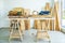 Background image of carpenters workstation, carpenters work table with different tools and wood cutting stand with wood shavings