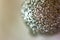 Background, image created by a close-up shot of a ball covered with glitter. abstract