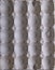 Background image of gray cardboard with repeating embossed relief