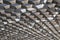 Background image of metal lattice roof of the bus stop