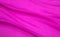 Background image of a pink light fabric folded