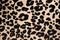 Background image of sporadic animal print on pinkish material