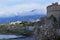 Background landscape view of the quay of Kyrenia and the tower of the Kirinis fortress on the north