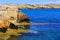 Background landscape view of the rocky coast in the reserve at Cape Capo Greco, Protaras