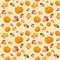 Background with leaves, acorns and pumpkins.